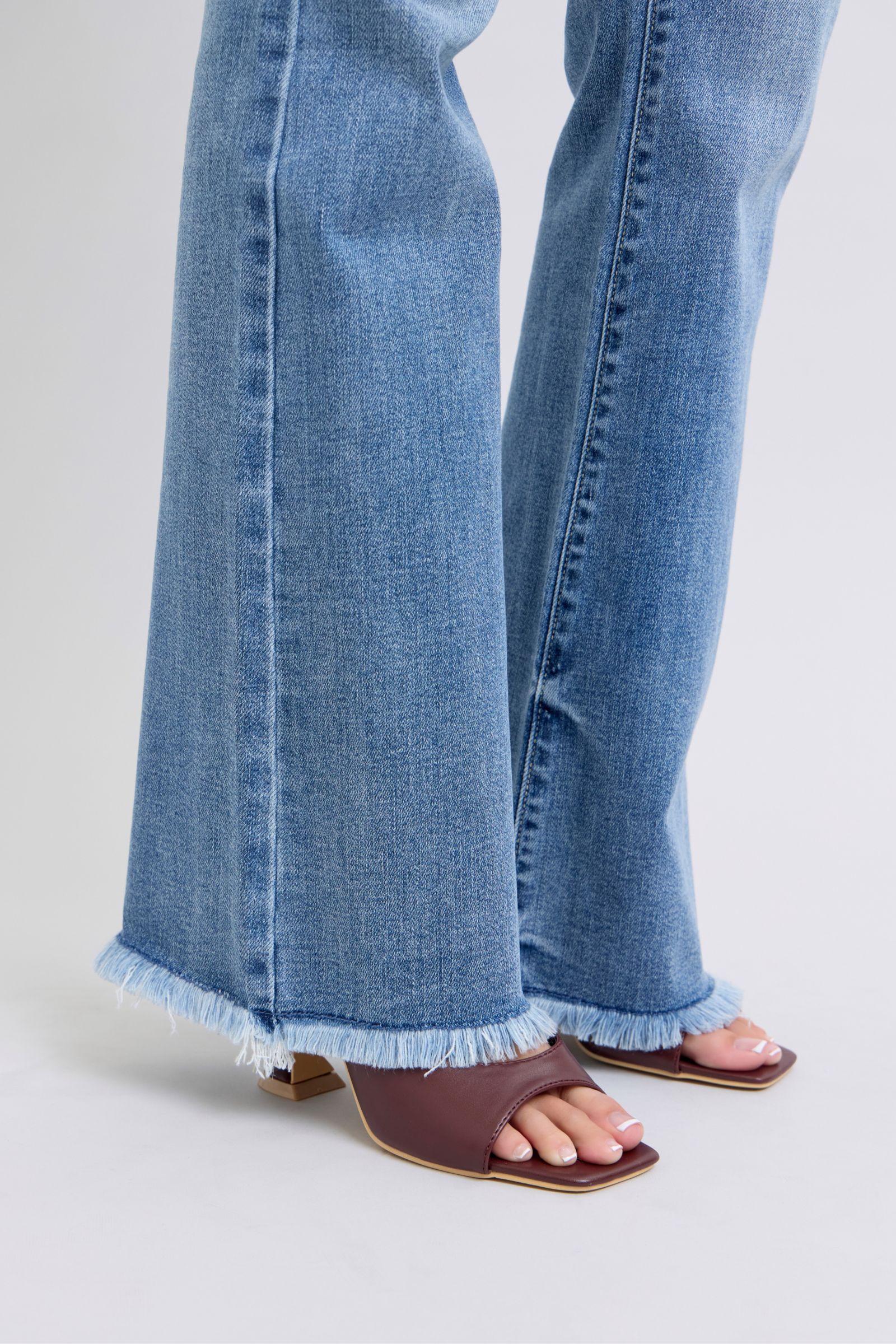 Judy Blue Full Size Raw Hem High Rise Bootcut Jeans - Thirty-One Boutique, LLC